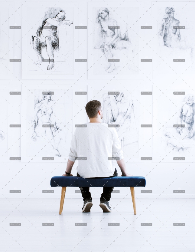 demo-attachment-218-man-relaxing-in-art-gallery-P9C4CGY-1